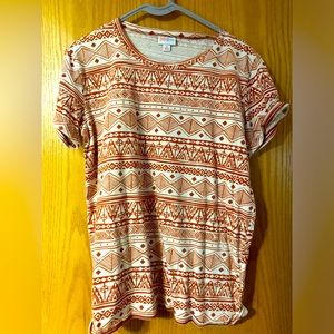 Cute Aztec pattern basic style short sleeve tee. Rust colored pattern. Medium